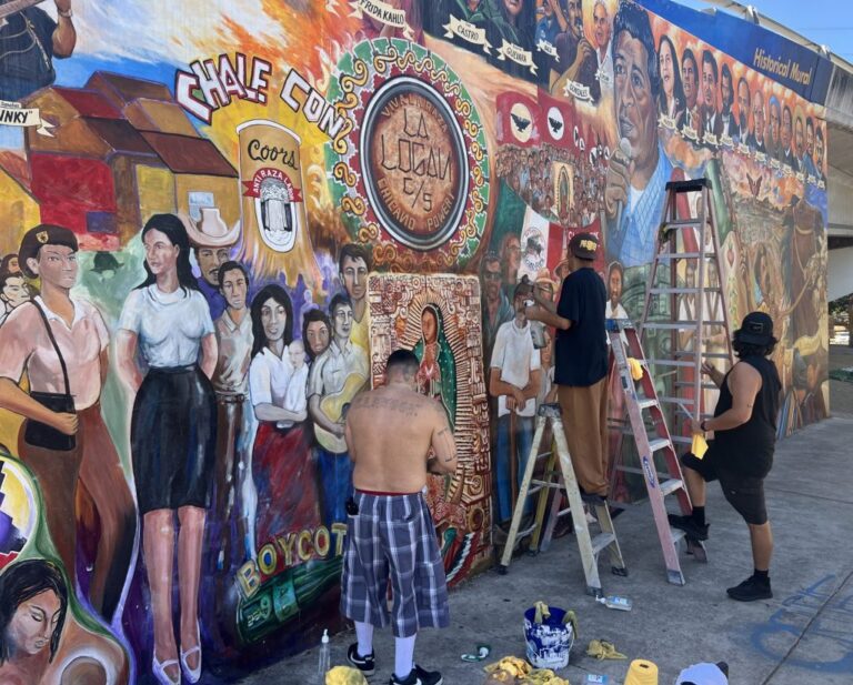 Barrio Logan community gathers to remove racist graffiti from Chicano Park mural